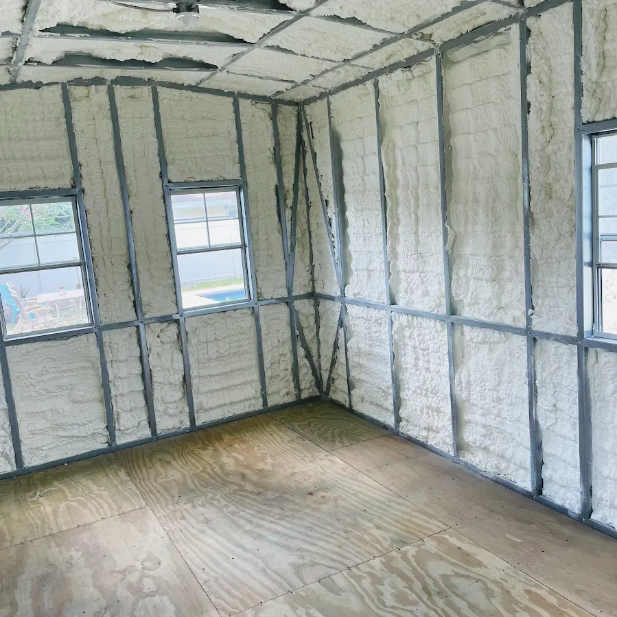 Closed-cell spray foam insulation applied to wall cavities in a residential project in Oak Bluffs
